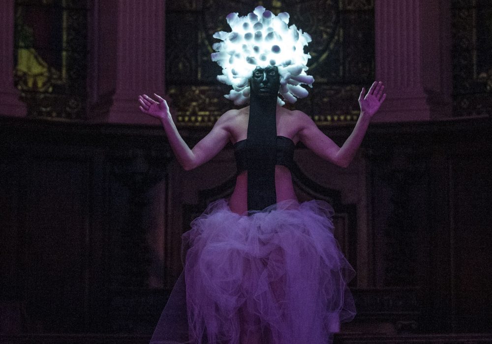 Woman with lit up headdress